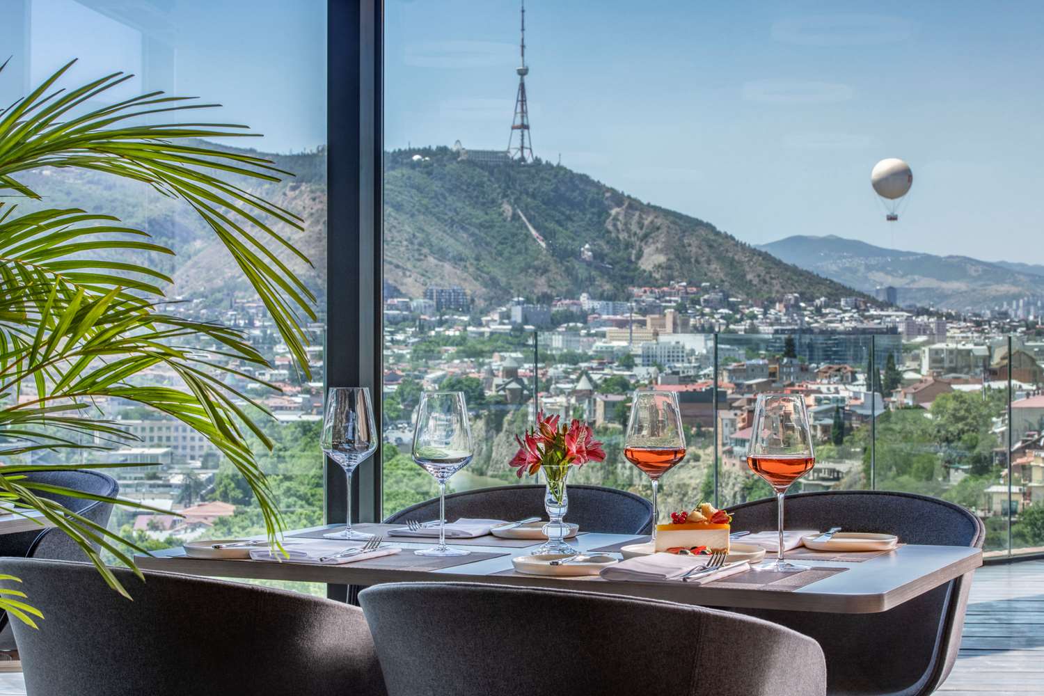 TITA Restaurant terrace table with Tbilisi skyline and hot air balloon